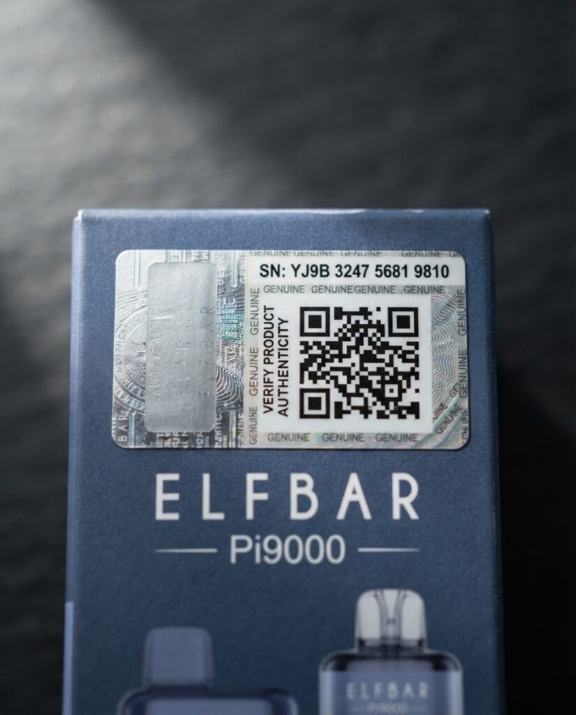 Elf Bar Pi9000 Review: Verified Specs and Clone Warning Close-up macro photograph of Elf Bar Pi9000 authentication scratch-off security label and QR code position on original packaging