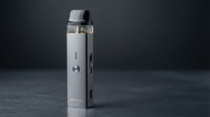Vaporesso XROS 4 review -- Space Grey aluminum alloy pod kit with 3ml top-fill pod on deep slate studio surface